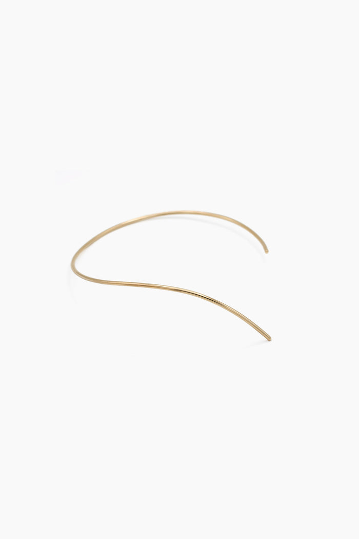 A 3 mm, open-ended curved wire choker in gold, displayed on a clean white background. Handcrafted in Brass.
