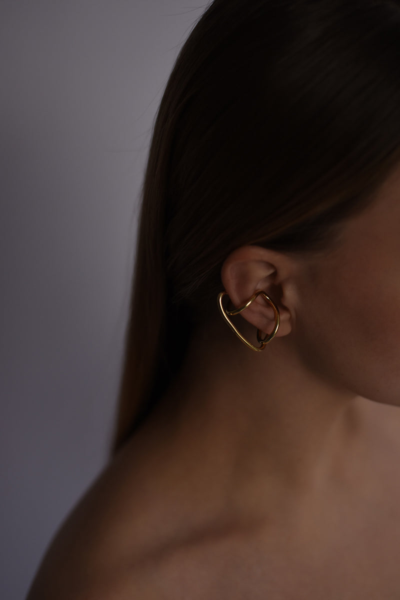 Gold statement jewelry alignment collection